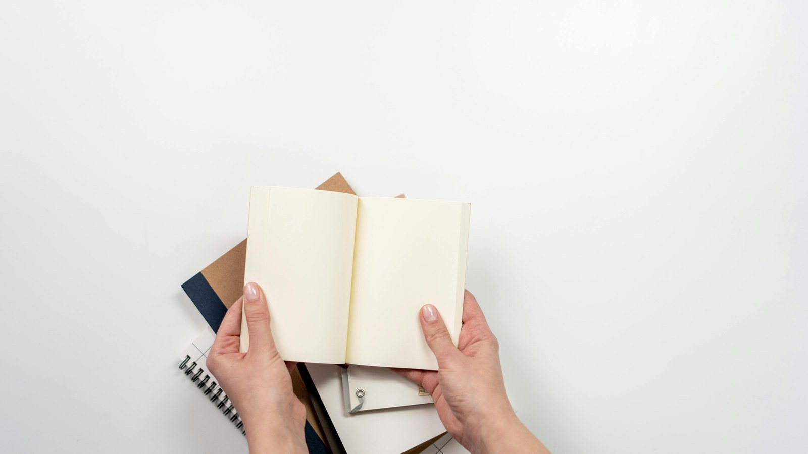 Open blank book prepared for a self-publisher direct sales project